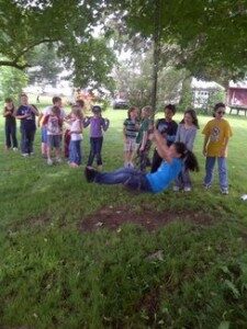 kids swinging on rope